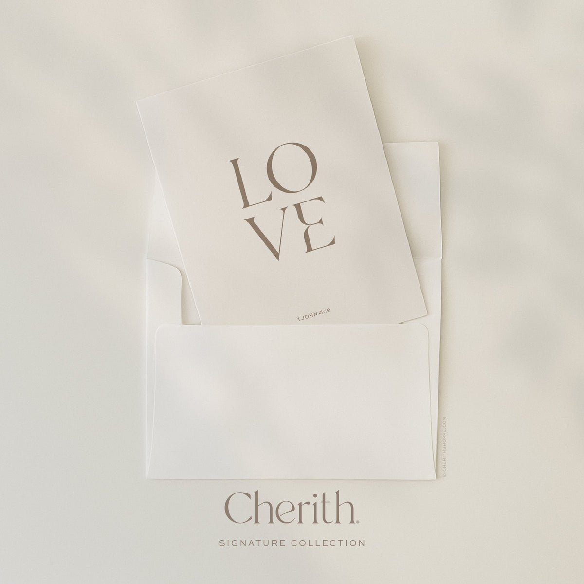LOVE 1 John 4:19 card tucked into an envelope, by Cherith.