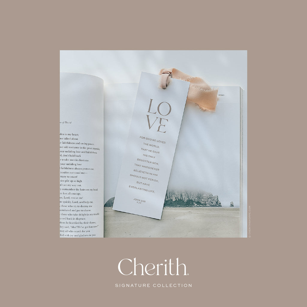 LOVE John 3:16 bookmark with a ribbon resting on a Bible, by Cherith.