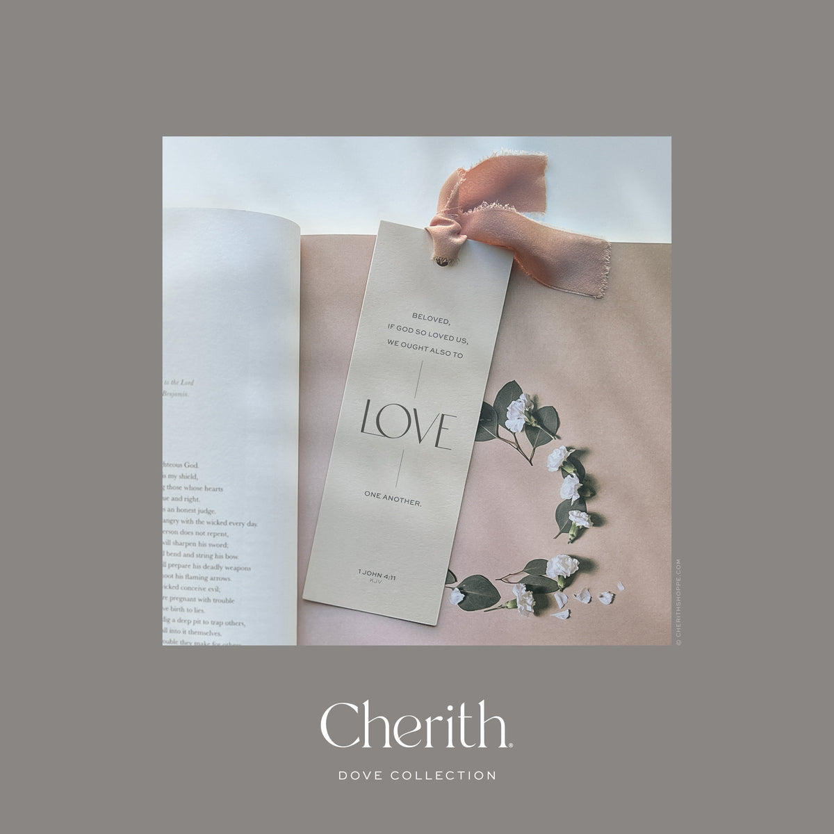 LOVE 1 John 4:11 bookmark with a ribbon resting on a Bible, by Cherith.