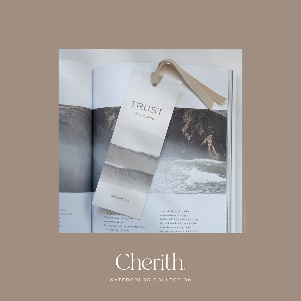 Trust in the Lord Proverbs 3:5 watercolor bookmark with a ribbon resting on a Bible, by Cherith.