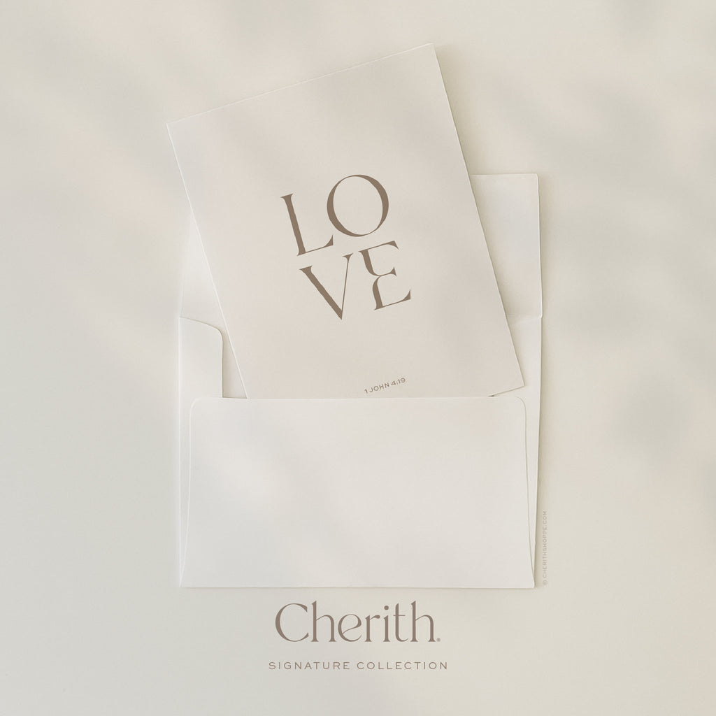 LOVE 1 John 4:19 card tucked into an envelope, by Cherith.