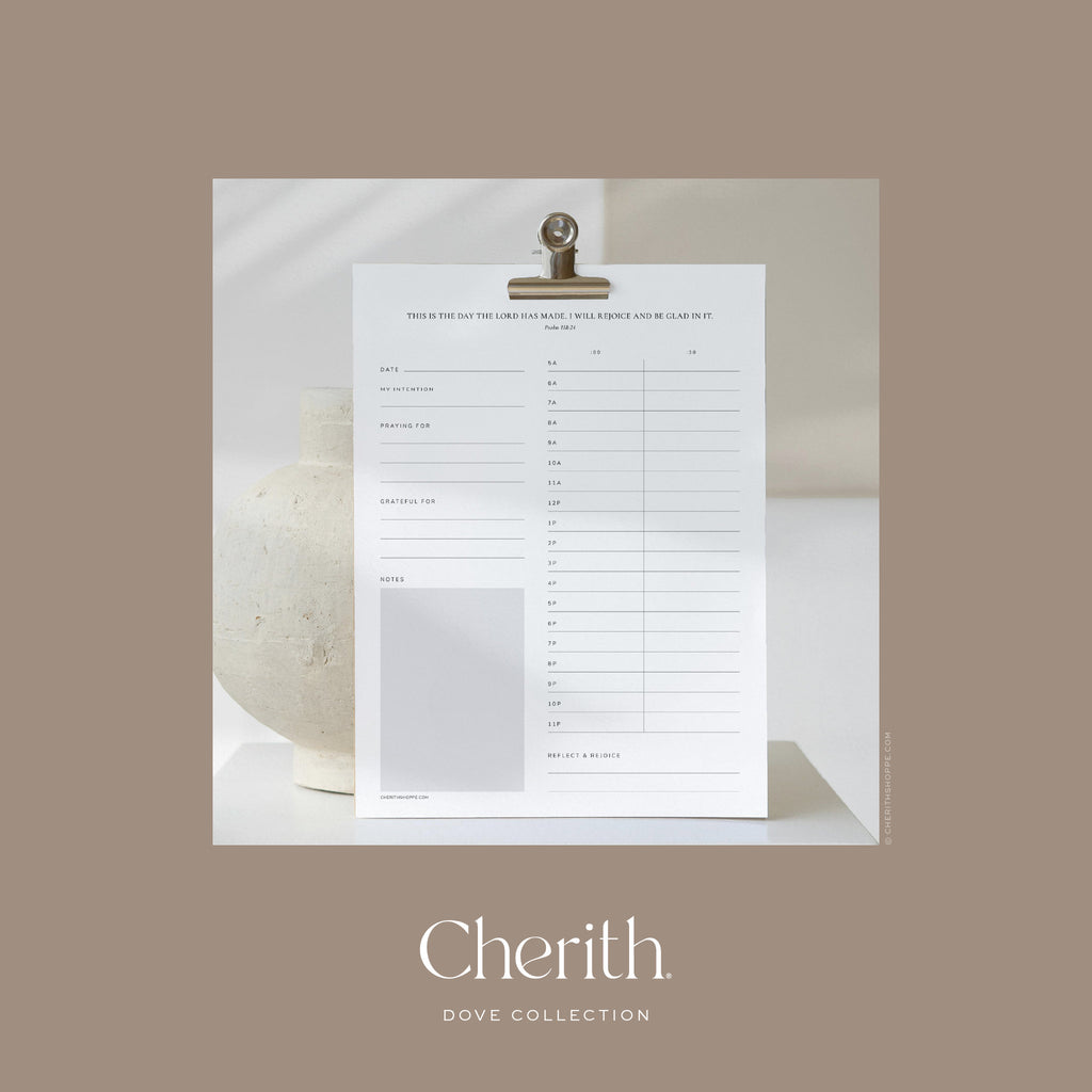 Psalm 118:24 daily planner on a clip beside a cream vase, by Cherith.