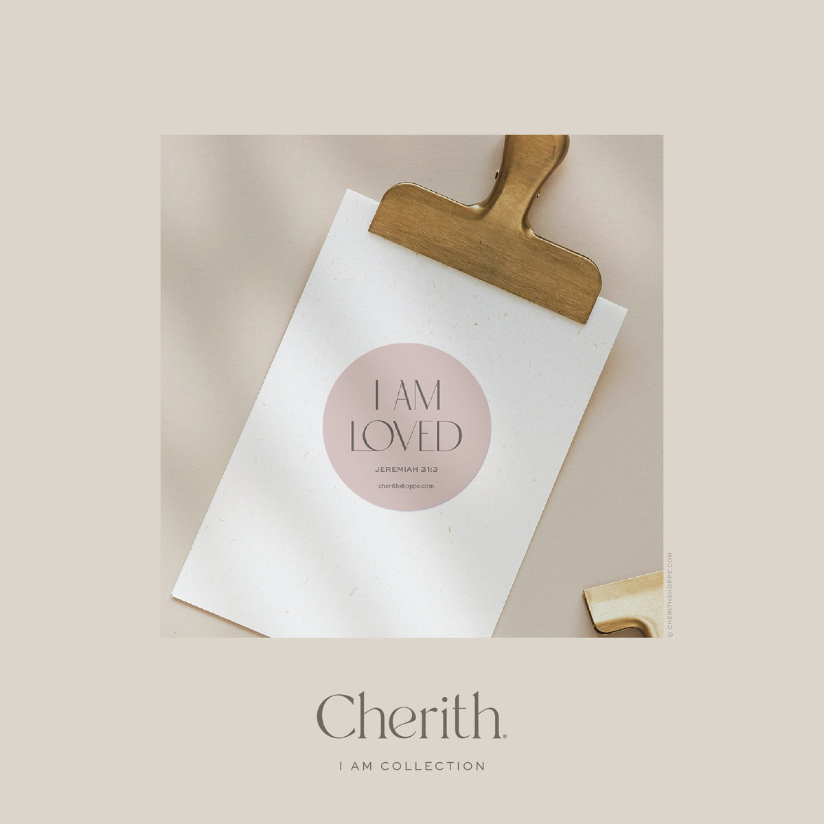 I Am Loved Jeremiah 31:3 round sticker on cream paper with a brass clip, by Cherith.
